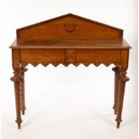 A Victorian oak hall table, with triangular pediment on turned legs,