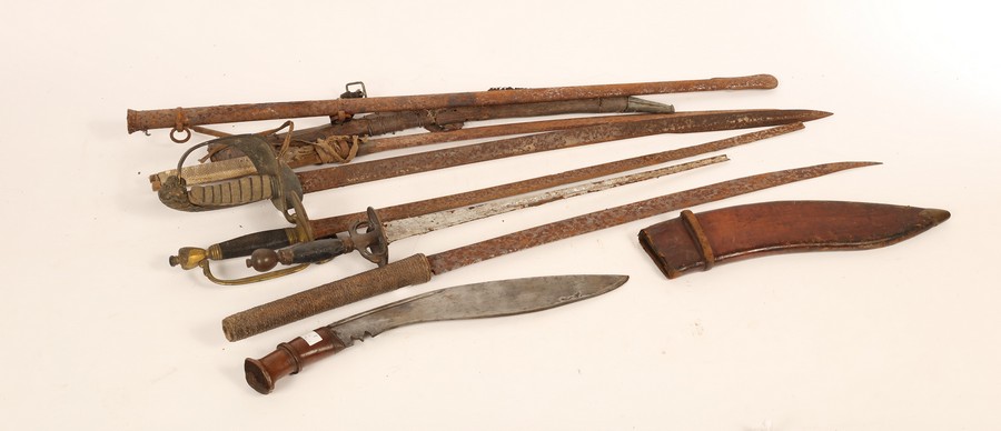 A group of six bladed weapons, to include a Japanese sword with a shagreen handle,