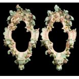 A pair of Samson porcelain flower-encrusted mirrors,