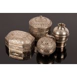 An Egyptian silver spice pot on stand with small ladle and three Eastern white metal boxes,