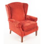 A Wesley Barrell wingback recliner armchair,