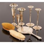 A pair of silver candlesticks, CJH, Birmingham 2008, three silver vases, a silver backed hair brush,