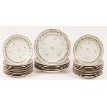 A set of six large circular dishes/soup plates with wavy moulded rim,