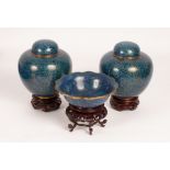 A pair of Chinese cloisonné ginger jars with lids, 20th Century, decorated floral motifs all over,