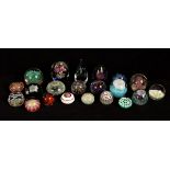 A collection of twenty-one modern paperweights,