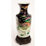 A Chinese porcelain vase, decorated ducks on a riverbank in bold enamels,
