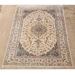 A part silk Nain rug, of foliate design to an ivory ground,