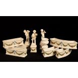A pottery table centre piece, comprising three crescent and three rectangular flower troughs,