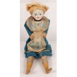 A bisque head doll with wooden legs and arms, 20cm long, five small French dolls,