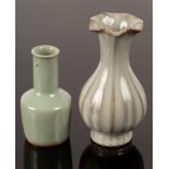 Two 20th Century Chinese porcelain celadon vases of ribbed baluster shape,
