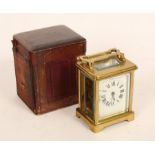 A French carriage time piece in gilt brass case, 13.