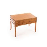 Peter Evans (died 2007), an afromosia low table, the drawers and sides with stepped design,