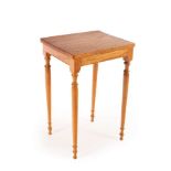 Peter Evans (died 2007), a small oak occasional table, the rectangular top on turned tapering legs,