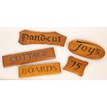 Joy Evans, five samples of wooden house signs, used at craft fairs as examples of her work,