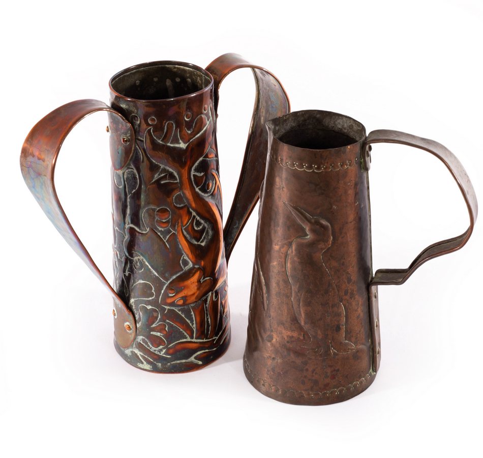Style of Newlyn, an Arts & Crafts copper jug of tapering form, embossed penguins,