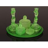A Walther & Sohne green uranium glass Nymphen dressing table set, decorated mermaids and fish,
