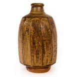 Phil Rogers (1951-2020), stoneware bottle vase with facetted body, green ash glaze,