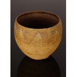 Chris Carter (born 1945), stoneware vessel, textured surface covered with ochre glaze,