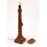 A Robert 'Mouseman' Thompson table lamp, the chipped carved column with a mouse and flared base, 43.