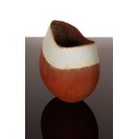 John Ward (born 1938), oval stoneware vessel with cut rim, pale blue and red/brown glazes,