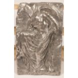 A metallic painted relief wall hanging of a Classical statue,