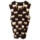 Issey Miyaki, a 'pleated' black and white top,