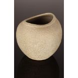 Chris Carter (born 1945), stoneware ovoid vase, textured surface covered in cream glaze,