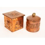 An Arts & Crafts circular copper tobacco box and cover with motto from Charles Kingsley's Westward
