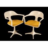 Two Emu fibreglass swivel chairs,