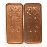 Two Arts & Crafts Newlyn copper trays, of rectangular form repousse decorated with fish,