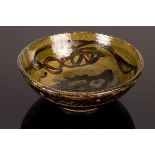 Bernard Forrester (1909-1990), stoneware bowl, ash glaze painted with stylised fish, signed,