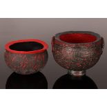 Philip Evans (born 1959), two hand built pots in black and red, both signed to base, the largest 7.