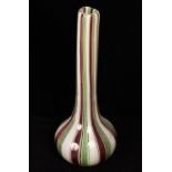 A Murano striped glass bottle, 40cm high and a clear and ruby glass bowl with ribbed sides,