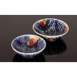 Clive Davis (born 1939), two small porcelain bowls, decorated cobalt lines with red,