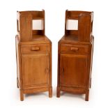 A pair of Arts & Crafts style walnut bedside tables,