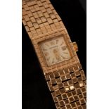 A Longines gold watch with gold bracelet CONDITION REPORT: Condition information is
