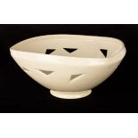 Ono Kotaro (Japanese, born 1953), three-sided pierced bowl, white glaze, 26cm diameter,