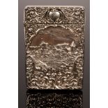 A castle top embossed silver visiting card case, Crisford & Norris Ltd.