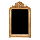 A late 19th Century gilt gesso wall mirror with floral and acanthus surmount and foliate border,