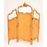 A late 19th Century three-panel screen with bevelled glass upper panels within scrolling silk