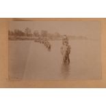 An album of forty-two late 19th Century Indian photographs, fishing scenes and elephants at work,
