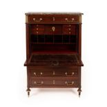An early 19th Century mahogany escritoire with grey marble top, frieze drawer and fall front,