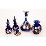 Five pieces of blue Laugharne glass with silver overlay, comprising a decanter, 25cm high,