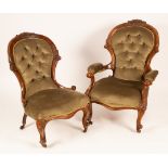 A pair of Victorian walnut lady and gentleman's chairs with carved frames on cabriole legs