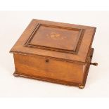 A late 19th Century Polyphon in a kingwood crossbanded case,