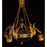 An Empire style gilt metal mounted electrolier with four swans each suspending an acanthus coronet,