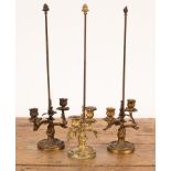 A pair of Louis XV gilt-bronze twin-branch candelabra,