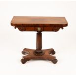 A Regency rosewood card table with scrolls to the frieze,