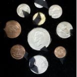 A 1953 Elizabeth II Coronation ten-piece coin set, cased,