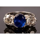 A sapphire and diamond three-stone ring,